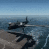 a fighter jet is taking off from a runway in the middle of the ocean .