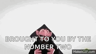 a puppet with a hat on is saying `` brought to you by the number two '' .
