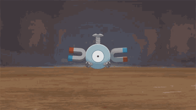 a cartoon drawing of a blue magnet with the letter u on it