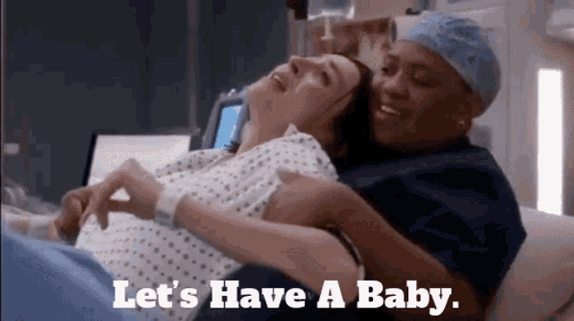 a pregnant woman is being held by a nurse with the words let 's have a baby below her