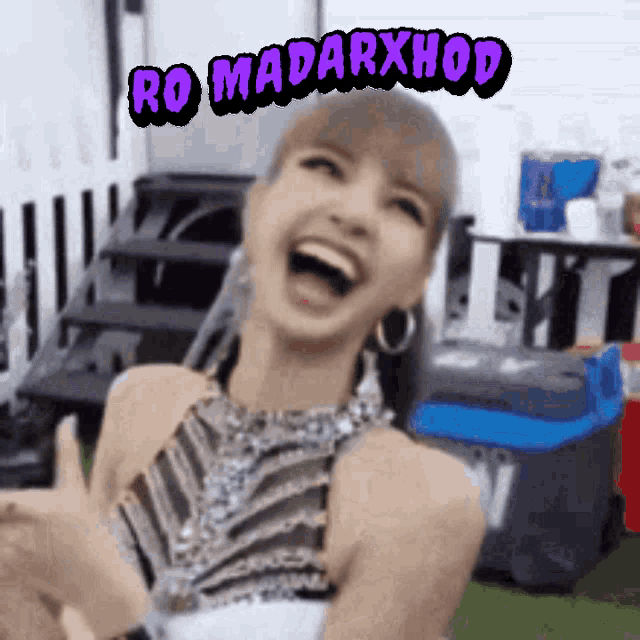 a woman is laughing with a sticker that says ro madarxhod