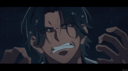 a close up of a man 's face with a shocked expression