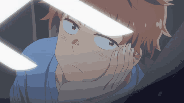 a close up of a person 's face with a white light shining on it