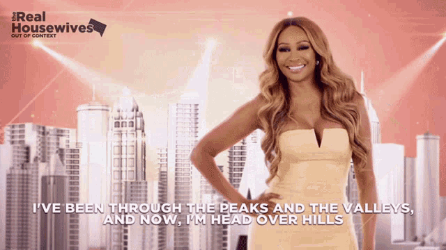 a poster for real housewives shows a woman in a strapless dress