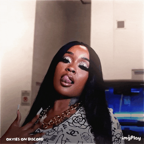 a gif of a woman sticking her tongue out with oxyies on discord at the bottom