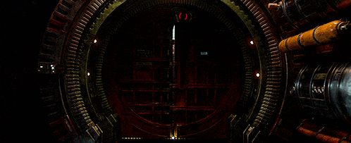 a man with red eyes standing in a dark tunnel
