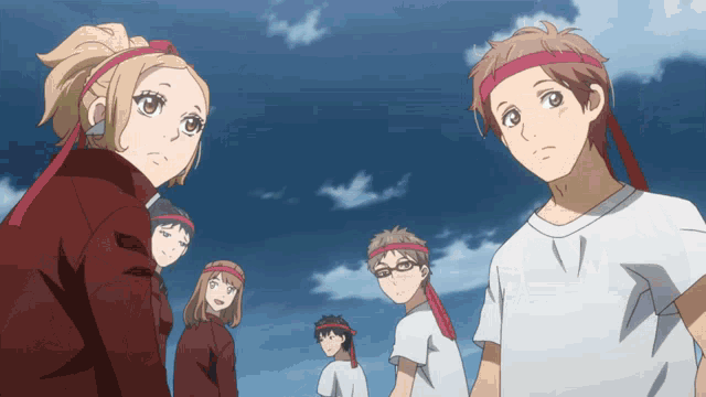 a group of anime characters wearing red headbands looking up at the sky