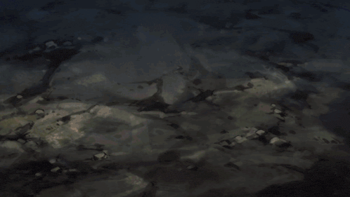 a person is holding a red item with the letter a on it