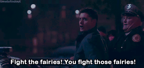 a police officer is talking to a man who is being arrested and says fight the fairies you fight those fairies .