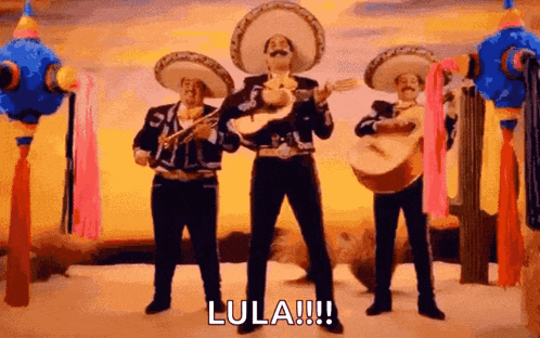 a group of mariachi singers are standing next to each other and playing instruments .
