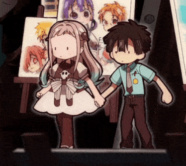 a boy and a girl standing next to each other