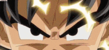 a close up of a cartoon character 's face with glowing eyes and a glowing light coming out of his eyes .