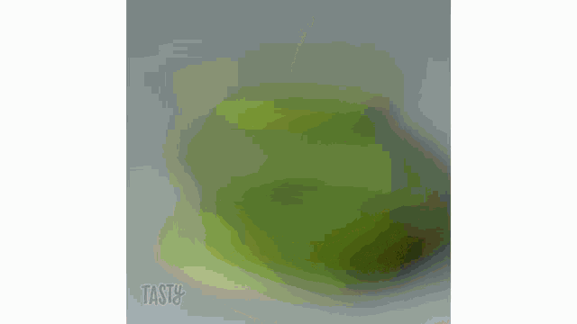 a green egg is being cooked at 300 degrees f for 15 minutes