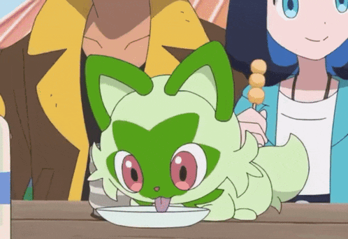 a green and white cartoon character is drinking from a white bowl
