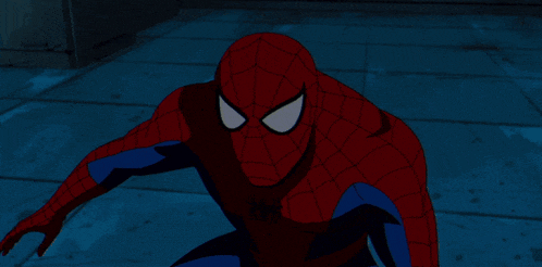 a close up of a cartoon spider man in a dark room
