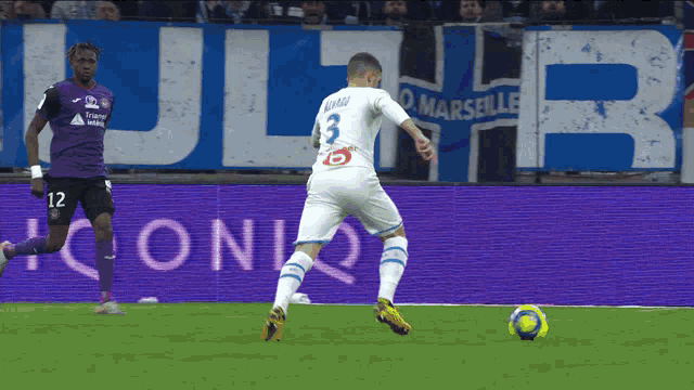 a soccer player with the number 3 on his back
