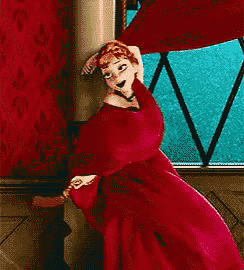 a woman in a red dress is dancing in front of a window
