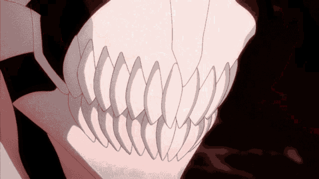 a close up of a person 's mouth with teeth