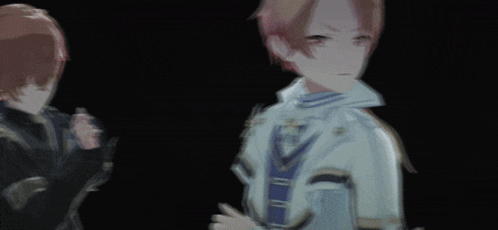 a boy and a girl are holding hands in the dark