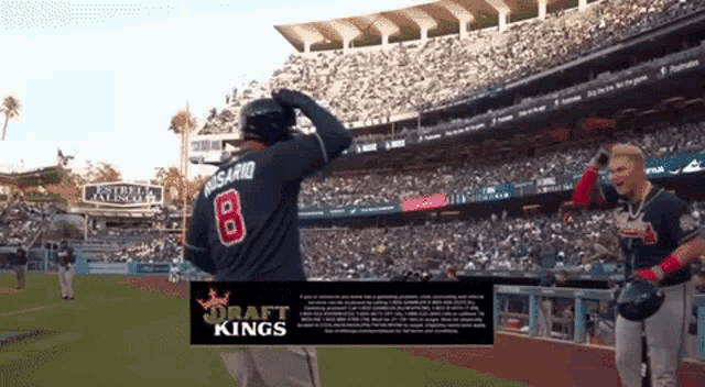 a baseball player wearing a jersey with the number 8