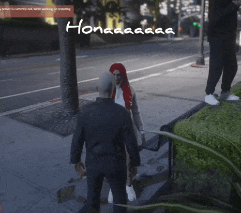 a woman with red hair is talking to a man in a video game with the word hon written on the screen