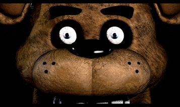 a close up of a brown teddy bear with white eyes