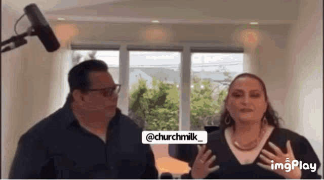 a man and a woman are standing in front of a microphone with a watermark that says @churchmilk