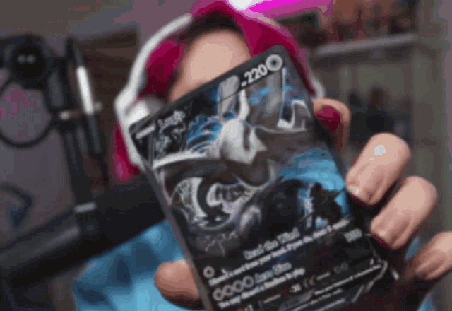 a person is holding a card that says jesus