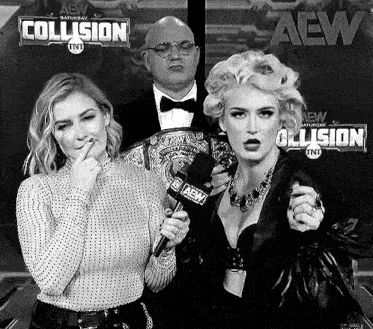 a man and two women are standing next to each other in front of a microphone in a black and white photo .