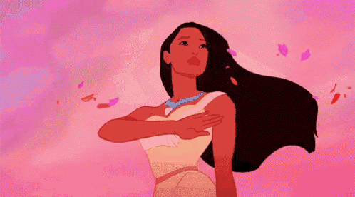 pocahontas from disney princess is blowing petals in the wind while covering her mouth .