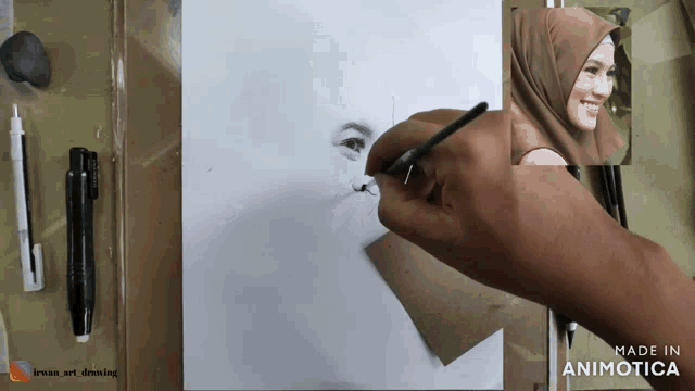 a drawing of a woman with a hijab is made in animotoca