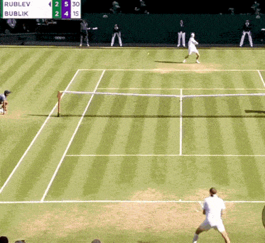 a tennis match between rublev and bublik with a scoreboard in the background