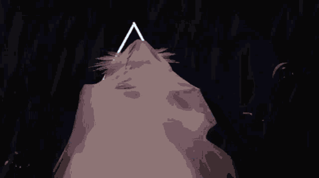a drawing of a mountain with a blue background