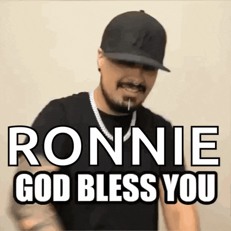 a man wearing a hat and a necklace says ronnie god bless you .