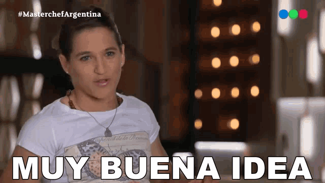 a woman wearing a white shirt with a butterfly on it says muy buena idea