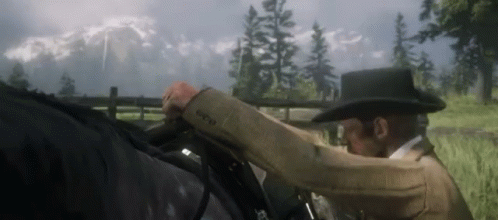 Mounting Horse Getting On Horse GIF - Mounting Horse Getting On Horse Red Dead Redemption GIFs
