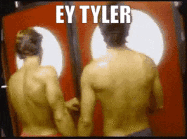 two shirtless men are standing in front of a red door and the words ey tyler are above them