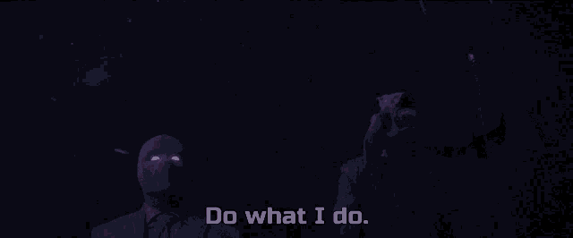 a man in a suit and a monster with glowing eyes are reaching up into the sky