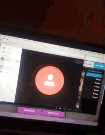 a computer screen shows a red circle with a person 's face in it