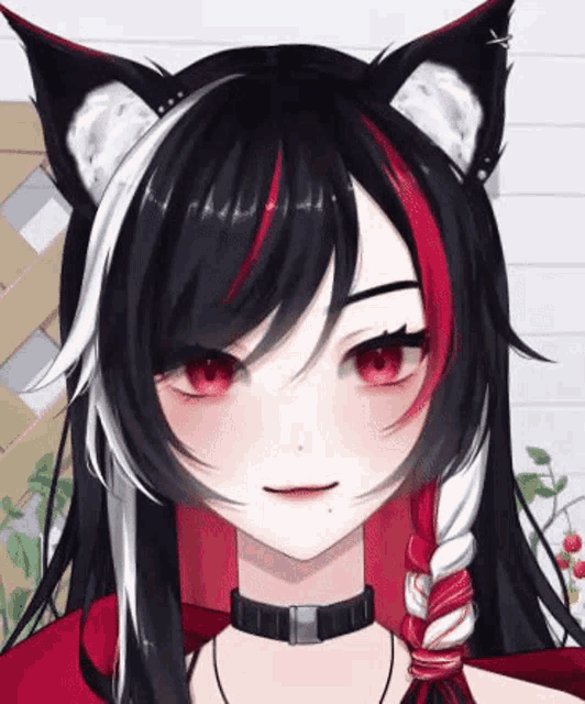 a close up of a girl with a cat ear and red and white hair .