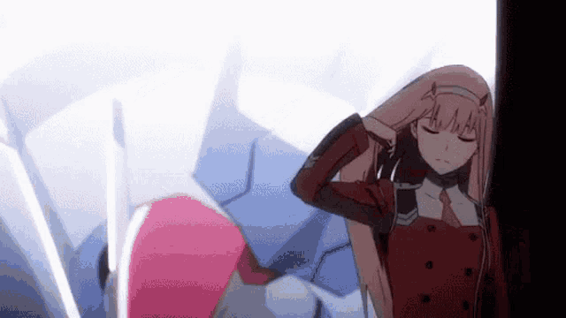 a girl with long hair is standing next to a robot .
