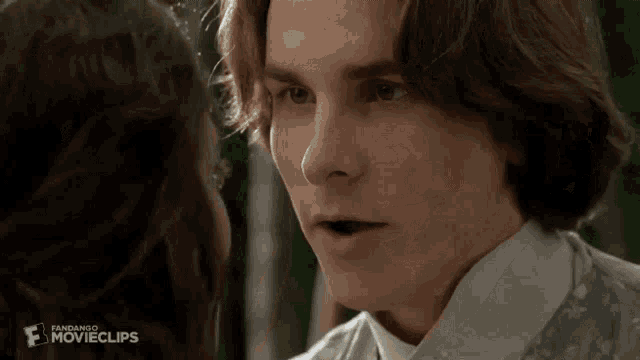 a close up of a man 's face with the word movieclips on the bottom right corner