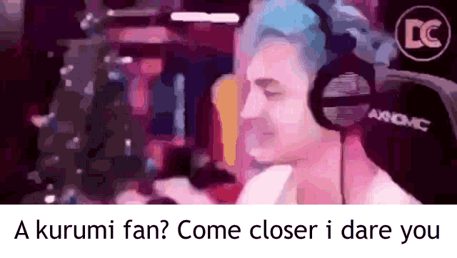 a man wearing headphones with the words a kurumi fan come closer i dare you below him