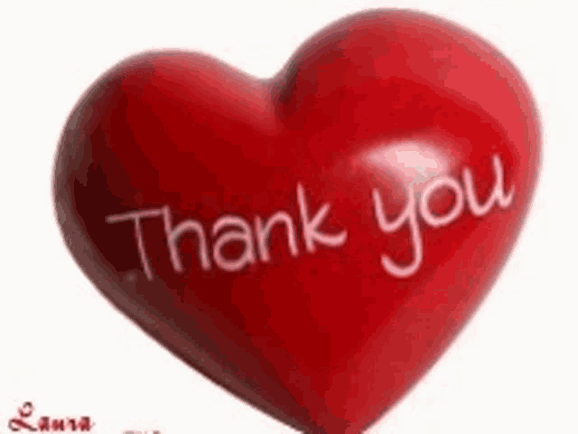 a red heart that says thank you on it
