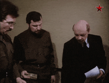 a man with a red star on his shoulder