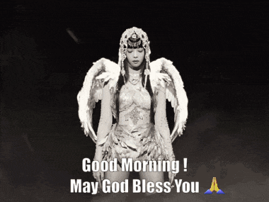 a black and white photo of a woman with angel wings and the words " good morning may god bless you "