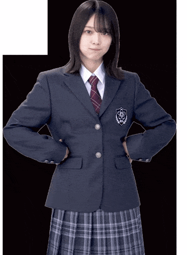 a girl in a school uniform has a badge on her jacket that says ' rc ' on it