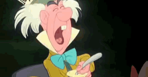 mad hatter from alice in wonderland is yawning while holding a spoon in his hand .