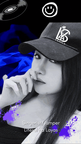 a woman wearing a hat that says ls family