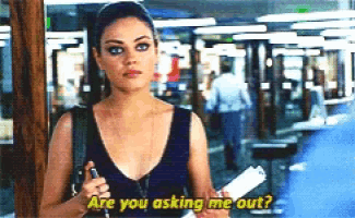 a woman in a black top is holding a clipboard and asking are you asking me out